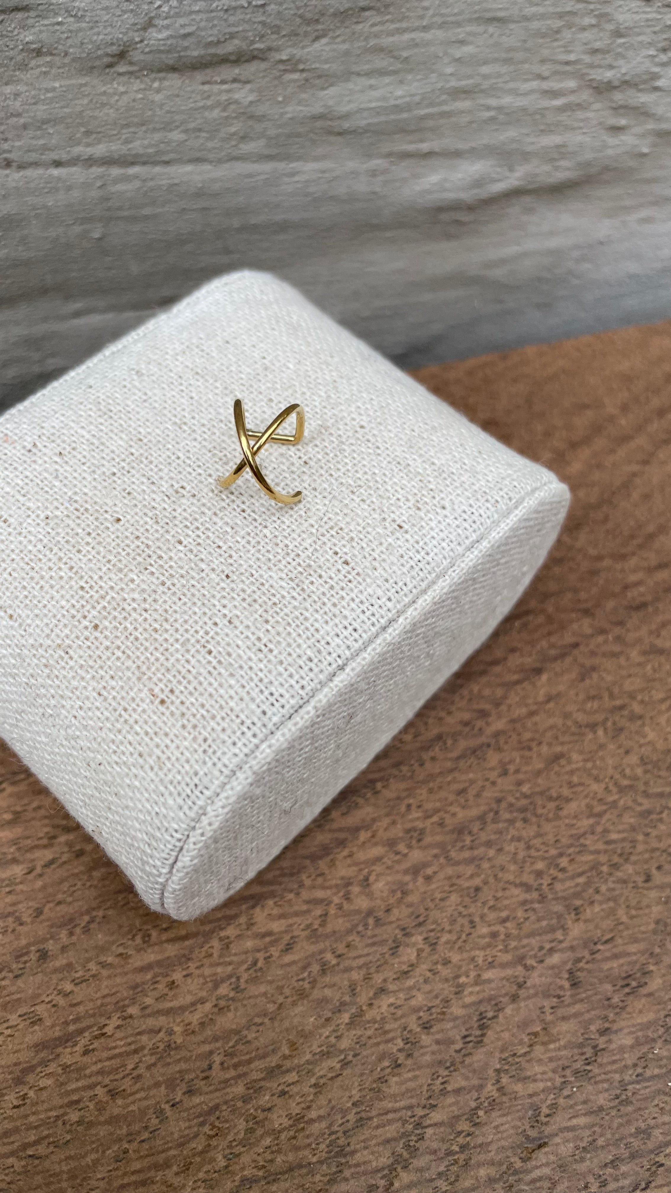 Cross cuff