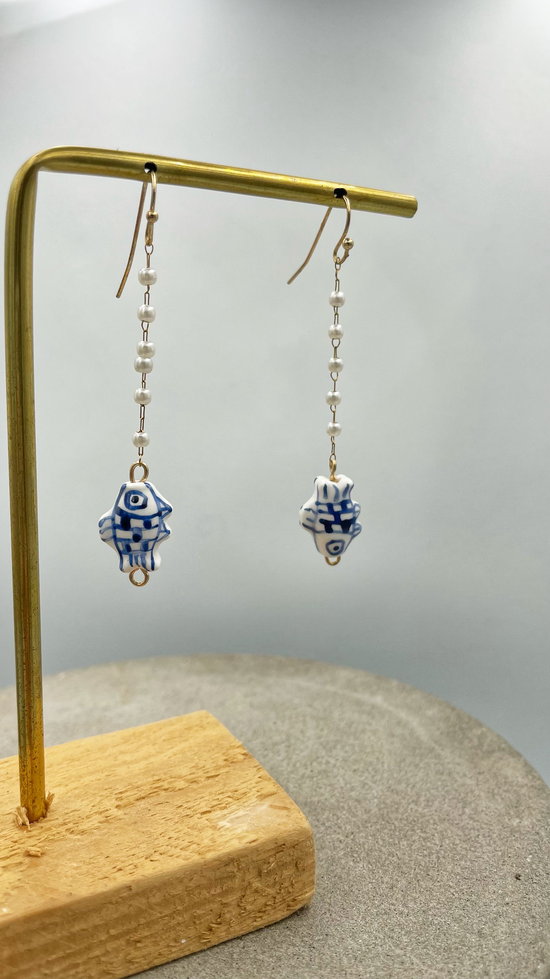 Blue fish and pearls