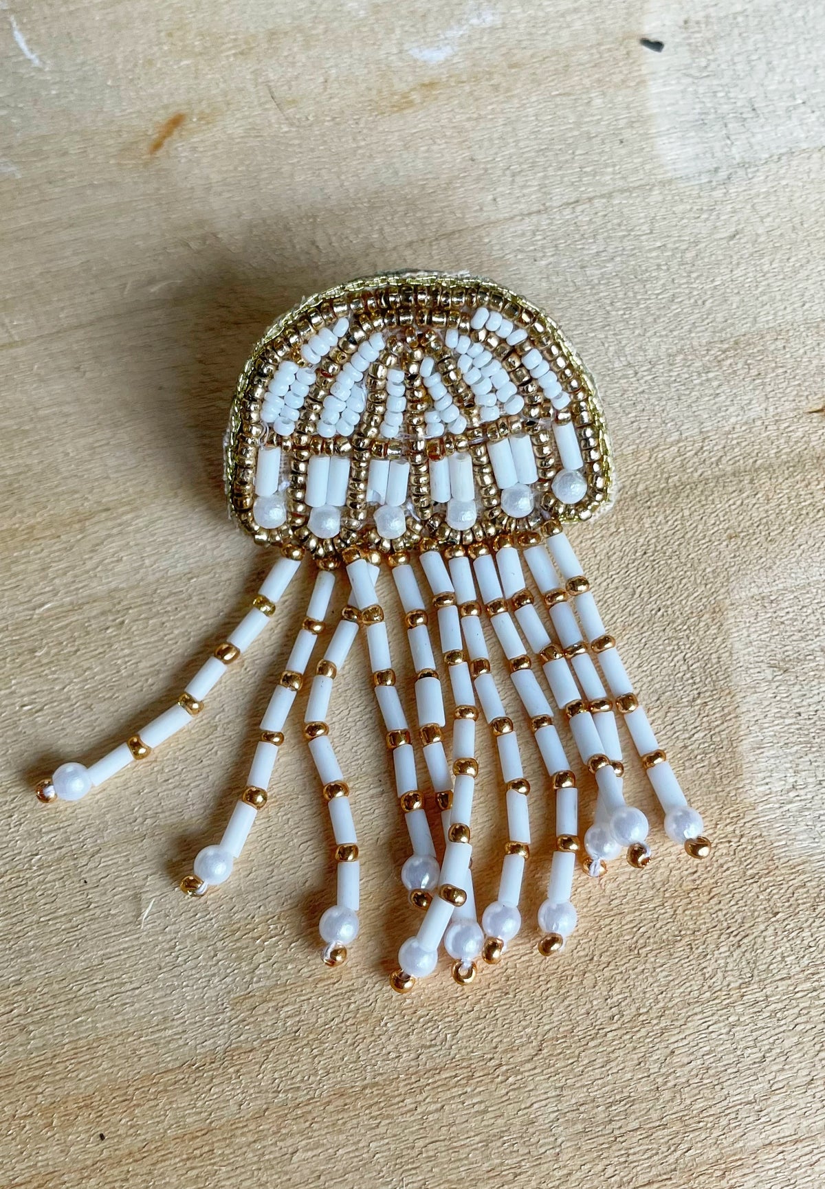 Kwal broche