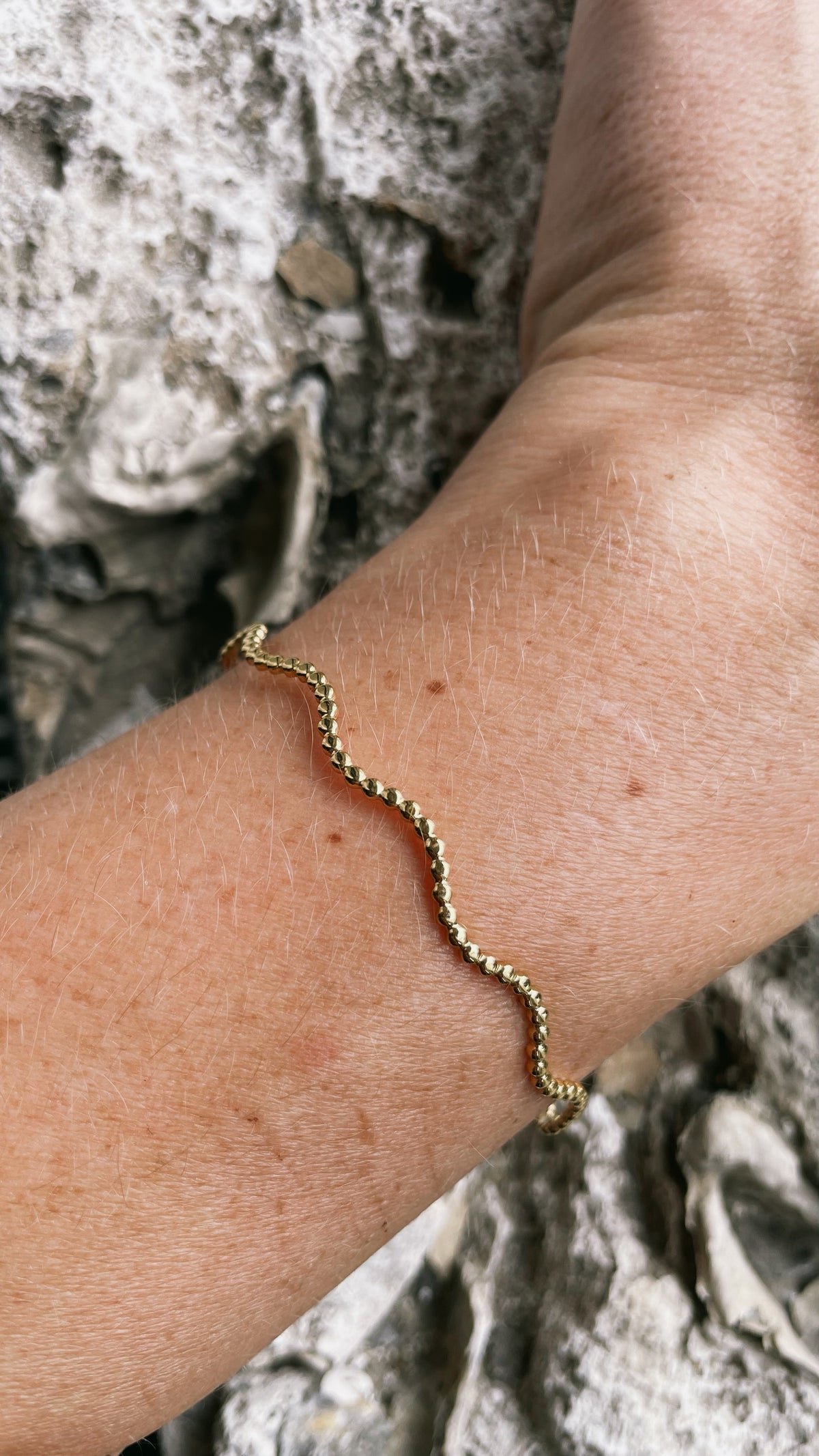 Arm cuff wave goud